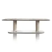 Distinguished DV Home Collection Adler table with light beige quilted leather columns and oval stainless steel base in a unique marble finish