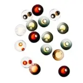 Wall-mounted glass globe lights in amber, green, burgundy & clear, featuring asymmetrical arrangement and warm internal light sources.
