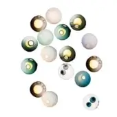 Wall lights, blown glass spheres, assorted colors, circular openings, brass accents, randomized cluster, translucent texture, diffused lighting.