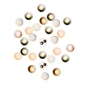 Spherical light fixtures in clear, amber, and pink tones are arranged in a circular pattern against a white backdrop, emitting a warm glow.