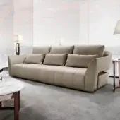Distinguished DV Home Collection Deco sofa with light beige textile upholstery and bronze finished steel frame