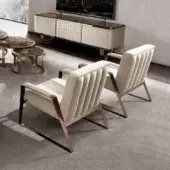 Exceptional DV Home Collection Deco lounge chair with light beige fabric upholstery and copper finished steel structure
