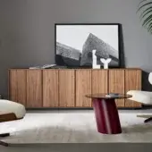 Elegant Bonaldo Backdrop sideboard with medium-toned brown wood doors and a natural wood grain finish built on an anthracite grey melamine plinth base