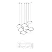 Linear chandelier with multiple slender cables supporting rounded stone-like forms, over a rectangular footprint schematic on white.