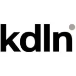 Kundalini logo, black sans-serif typeface, minimalist design featuring “kdlIn” text with gray circular accent on white background.