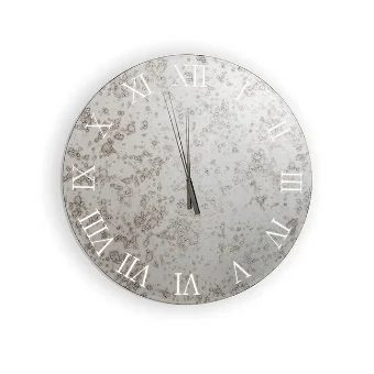 Round wall clock with distressed mirror glass and Roman numerals, silver hands set to twelve o'clock against a white backdrop.