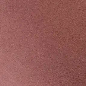 Burgundy textured surface with granular finish, displaying tonal variations and diffused lighting, associated with Formitalia Noby line.
