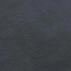 Dark gray slate texture with undulating lines and matte finish, displaying subtle tonal variations and uniform diffused lighting.