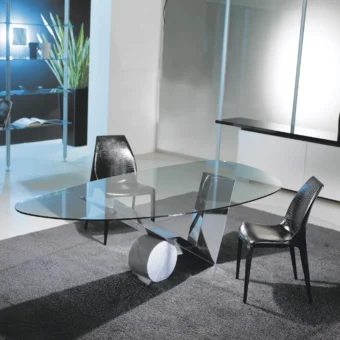 Exceptional Cattelan Italia Valentinox table built in clear glass with a polished stainless steel base and striking Travertine marble cylinder