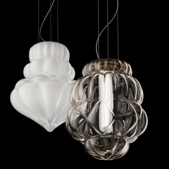 Exceptional Barovier&Toso Vallonné suspension lamp crafted in opaline Venetian crystal with a tiered silhouette and precise linear incisions
