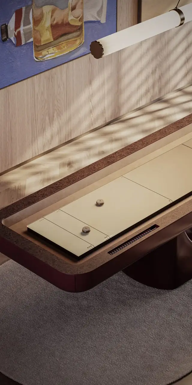 Superior Vismara Flume shuffleboard table built with wood and soft suede in a warm brown lacquered finish