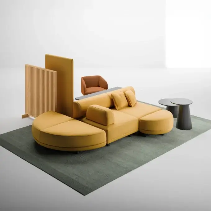 Cassoni la cividina modular sofa, mustard yellow upholstery, rounded sectional with chaise and ottoman on green rug.