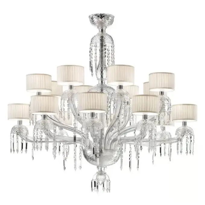 Crystal chandelier with polished chrome framework, sixteen ribbed off-white lampshades, and cascading clear crystal pendants, studio shot.