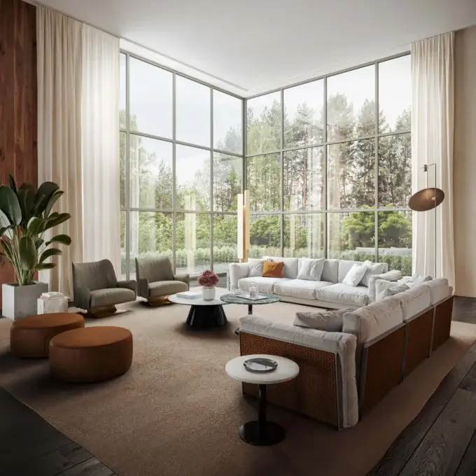 Modular sofa, light gray fabric, brown leather accents in a living room with forest view, marble coffee table, wood flooring.