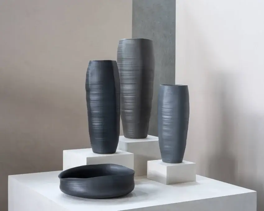Distinguished Rina Menardi Cenote vessel set crafted in baked clay with undulating silhouettes and matte finish