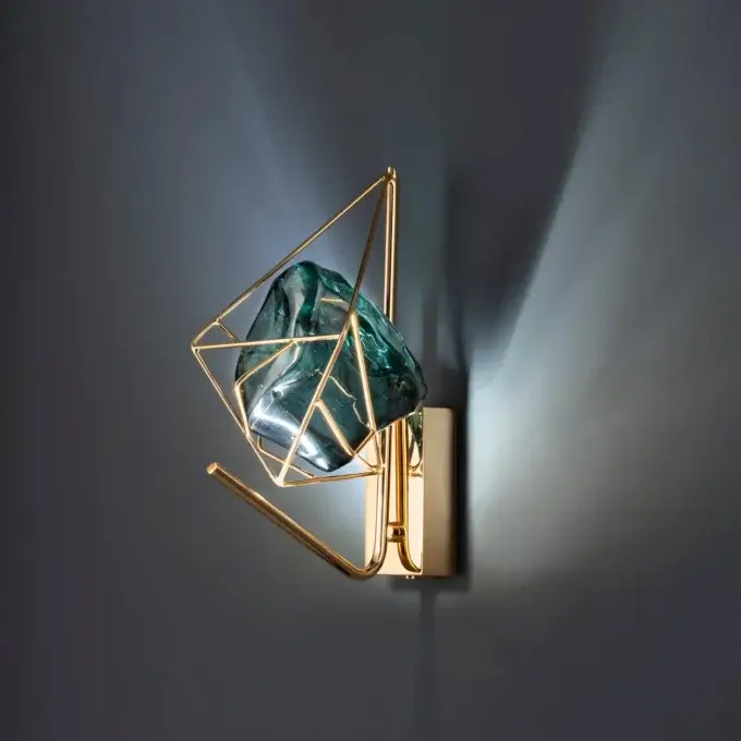 Exceptional Euroluce Cryrock wall lamp crafted in teal glass and Tuscan crystal rock with a golden finish