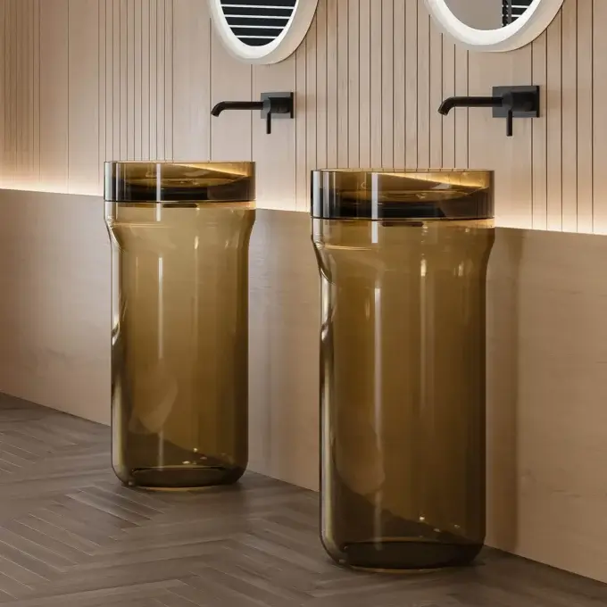 Avant-garde NORAH DESIGN ISCN 01 sink sculpted from warm amber Norahcrystal with a polished rim