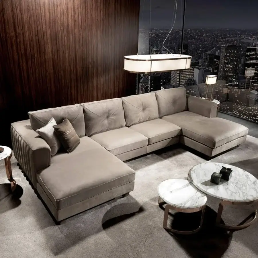 Exceptional DV Home Collection Beverly sectional with warm gray fabric upholstery and quilted detailing