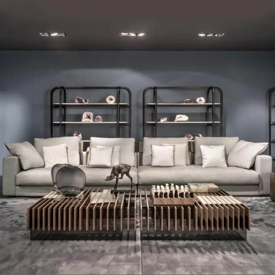 Superior Giorgetti Skyline sofa with textured light gray textile upholstery and reclining headrest mechanism