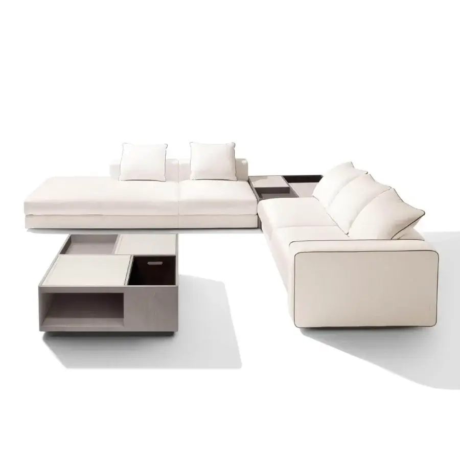 Distinguished Giorgetti Skyline sectional upholstered in light cream fabric with dark brown piping and integrated shelves