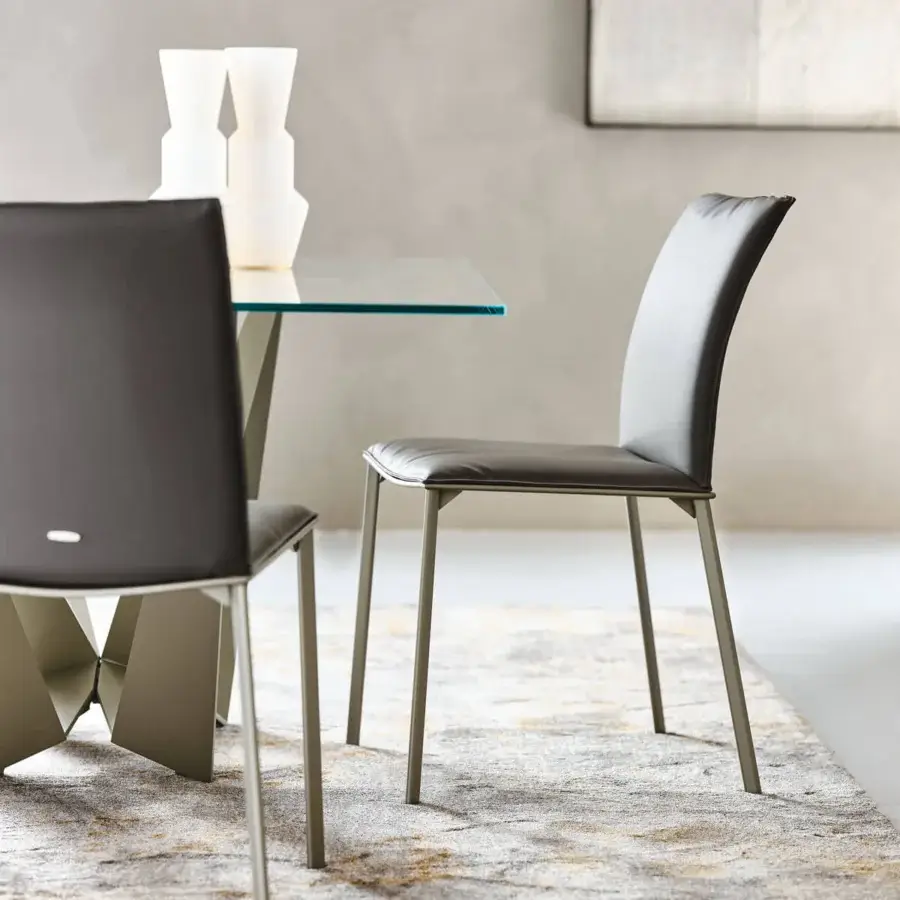 Superior Cattelan Italia Rita chair with graphite painted steel frame and dark gray synthetic or soft leather upholstery
