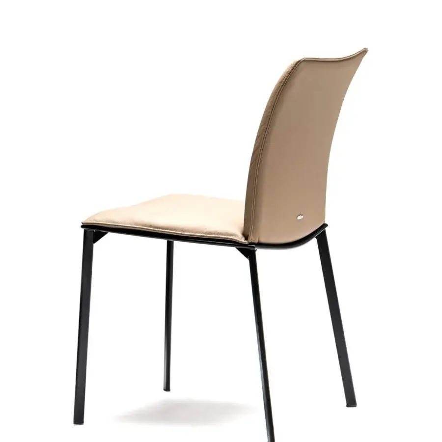 Lavish Cattelan Italia Rita chair with graphite painted steel frame and light beige synthetic leather upholstery