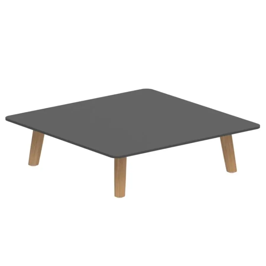 Comfortable Royal Botania Mambo Lounge coffee table in dark gray ceramic with warm-toned wooden legs and a square, low profile design.