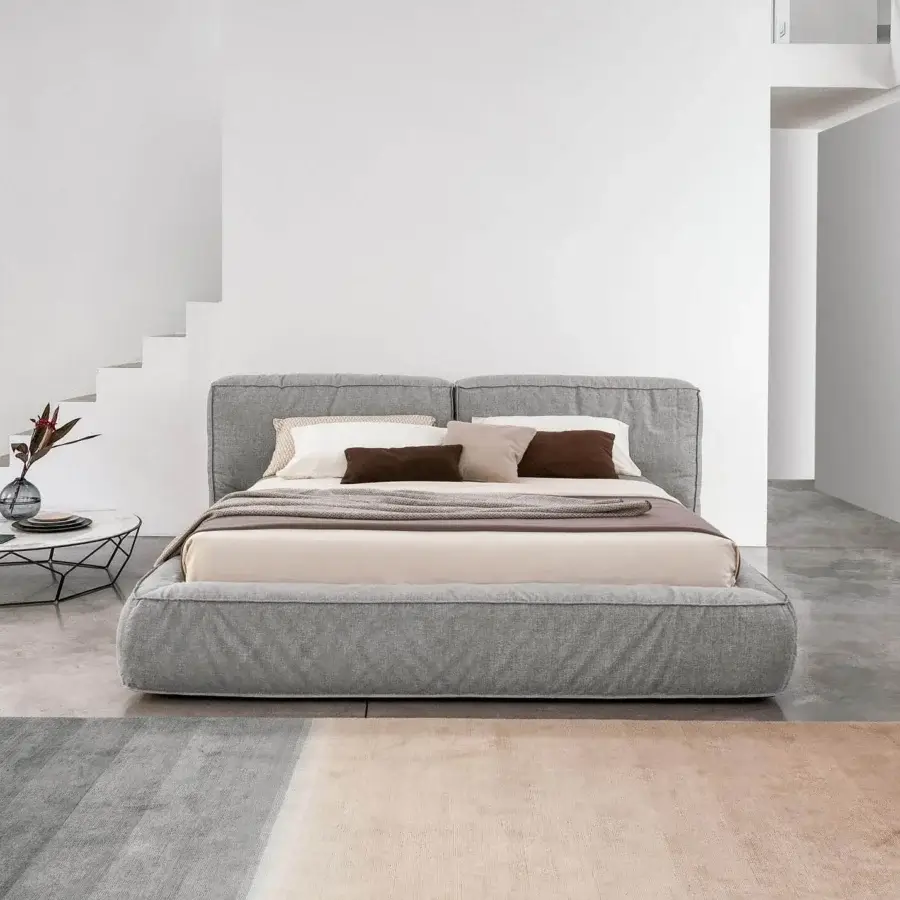 Distinguished Bonaldo Fluff bed with soft rounded design upholstered in textured gray fabric crafted in Italy