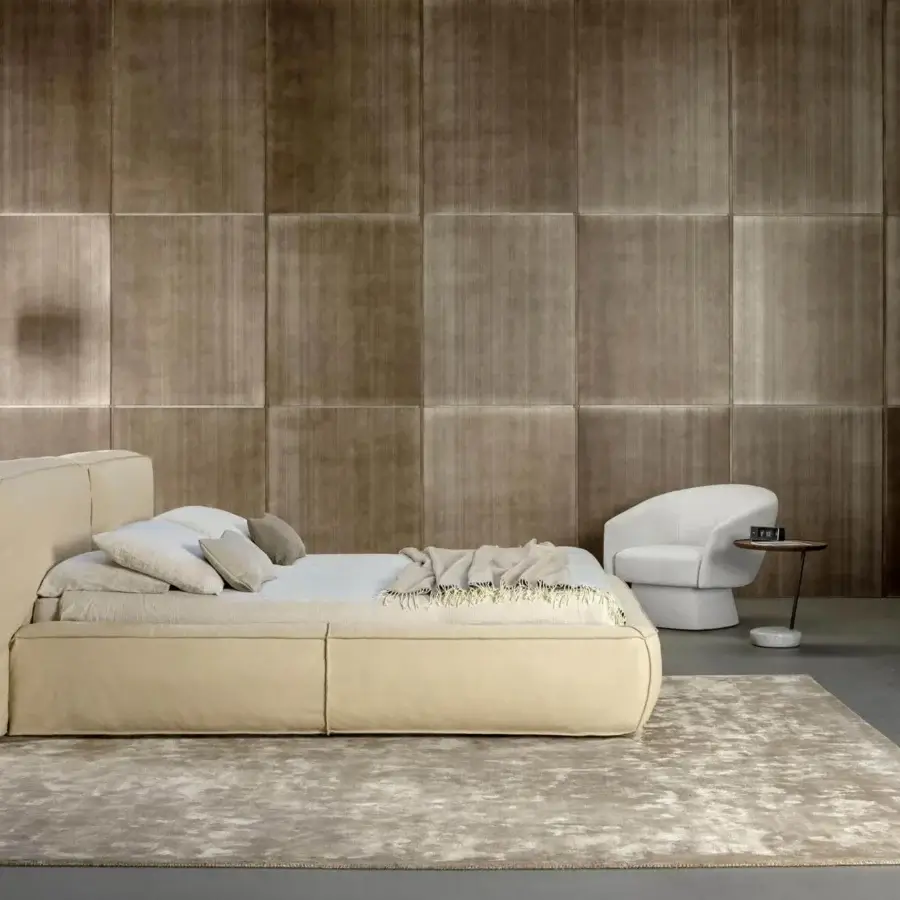 Lavish Bonaldo Fluff bed with rounded silhouette upholstered in beige textile featuring a matte finish