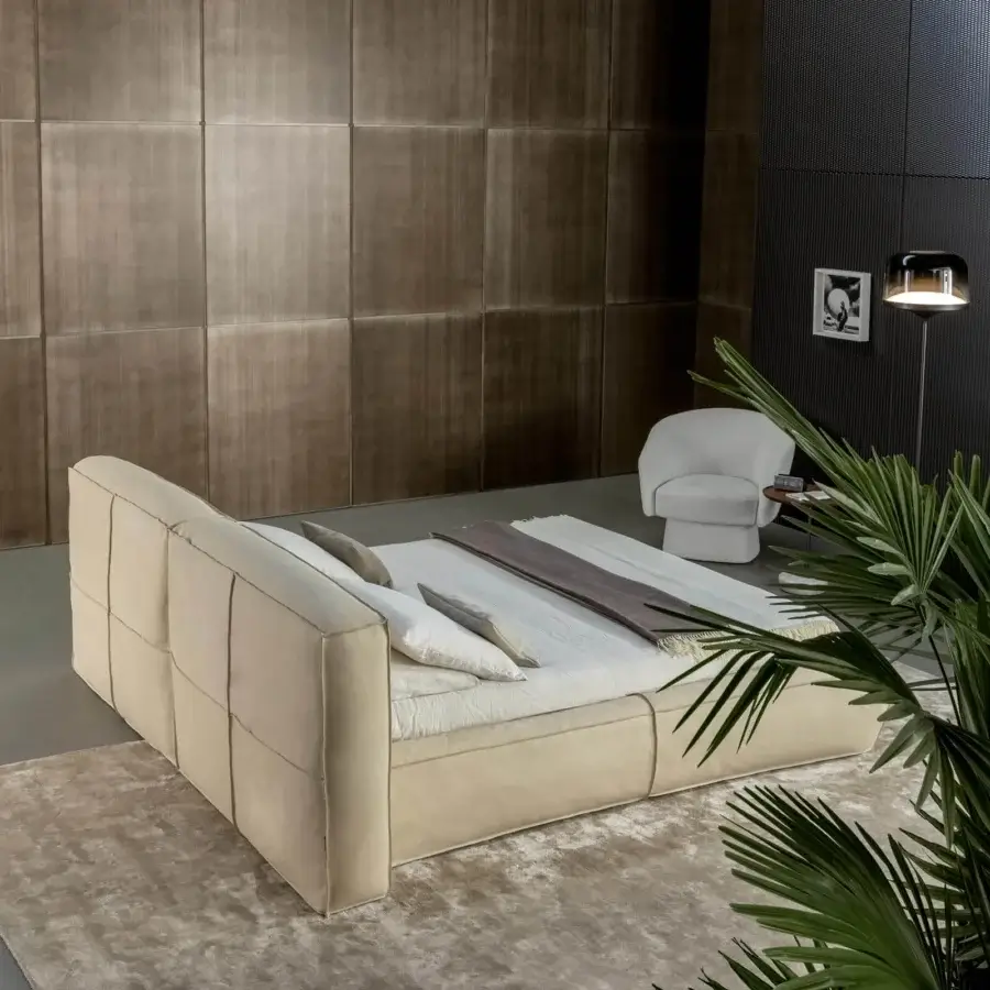 Distinguished Bonaldo Fluff bed with soft rounded design upholstered in light beige fabric exhibiting a smooth finish