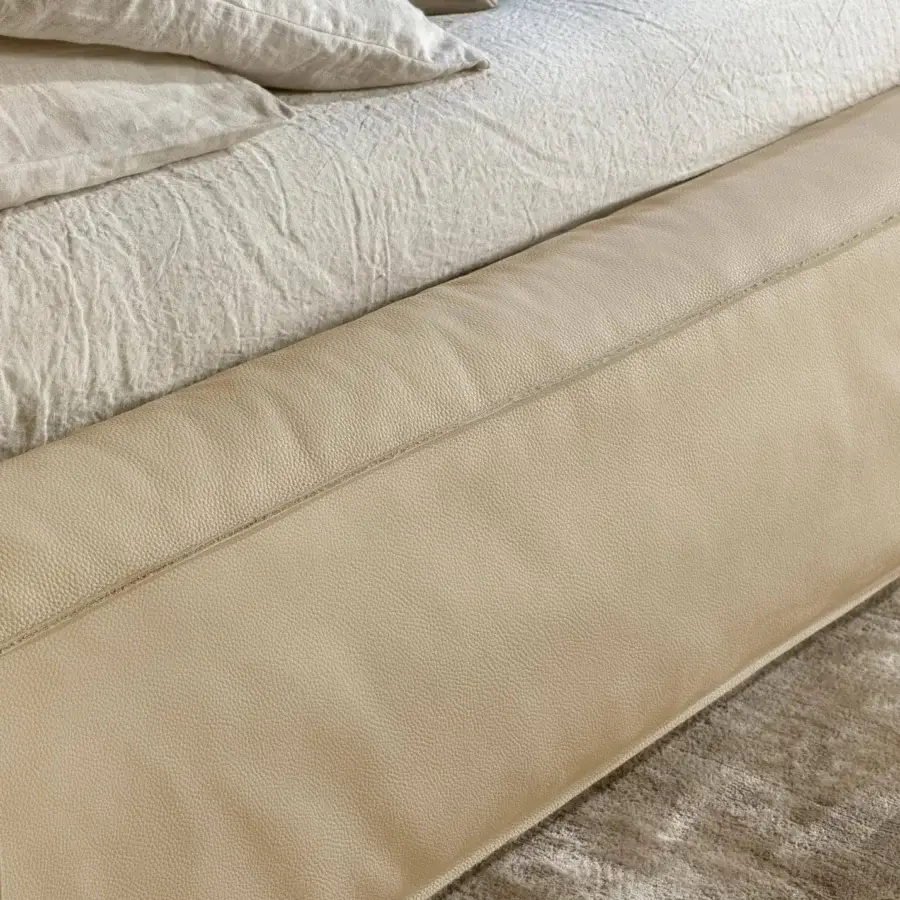 Superior Bonaldo Fluff bed with soft rounded design upholstered in light beige leather including a slatted base