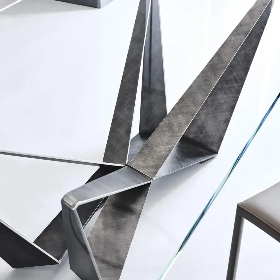 Exclusive Cattelan Italia Skorpio table with a transparent glass top and graphite embossed lacquered steel base in a matte finish