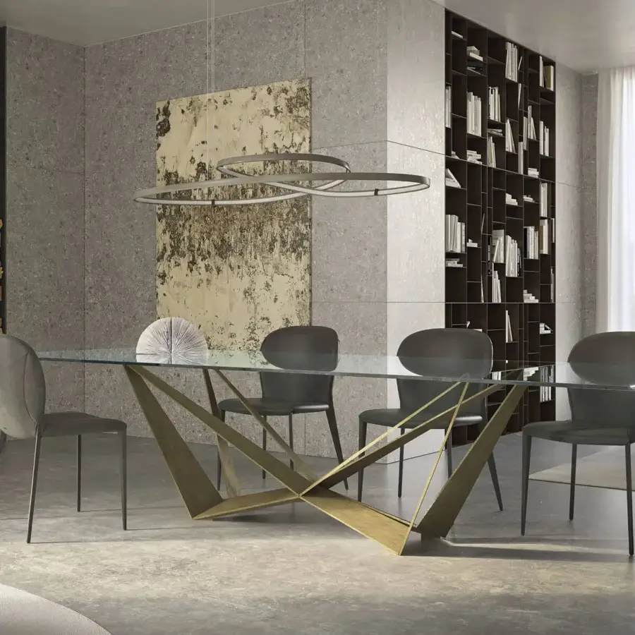 Exceptional Cattelan Italia Skorpio table with glossy extra-clear glass and brushed bronze lacquered steel base