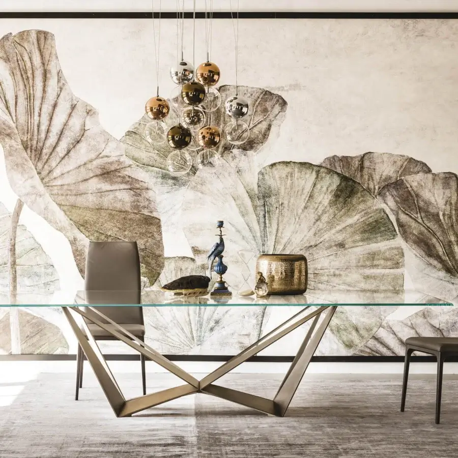 Elegant Cattelan Italia Skorpio table with extra-clear glass and light bronze embossed lacquered steel base crafted in Italy