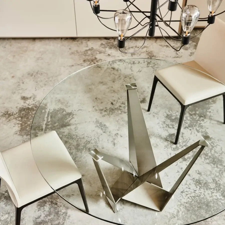 Exclusive Cattelan Italia Skorpio table with transparent glass and sculptural titanium metal base