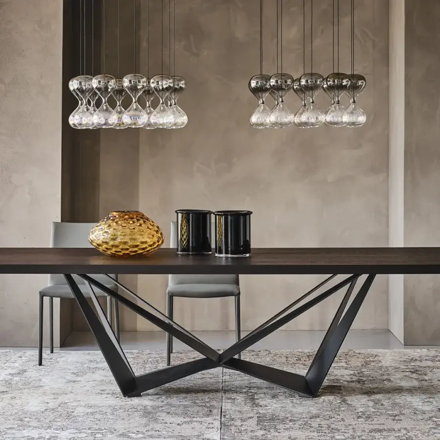 Lavish Cattelan Italia Skorpio Wood table with a dark Canaletto walnut barrel top and black embossed lacquered steel base