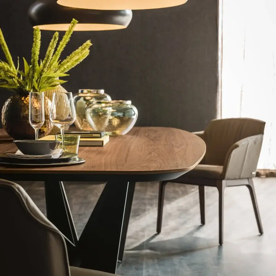 Distinguished Cattelan Italia Skorpio Wood table with Canaletto walnut barrel top and black embossed lacquered steel base