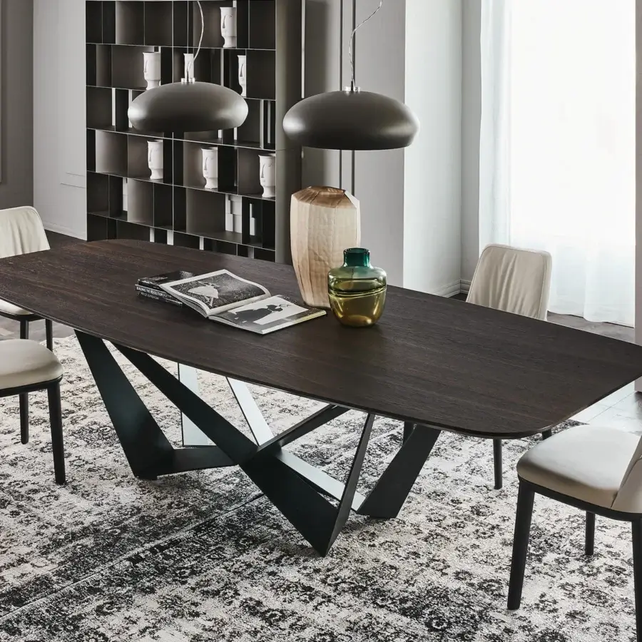 Distinguished Cattelan Italia Skorpio Wood table with Canaletto walnut barrel top and embossed lacquered black steel base