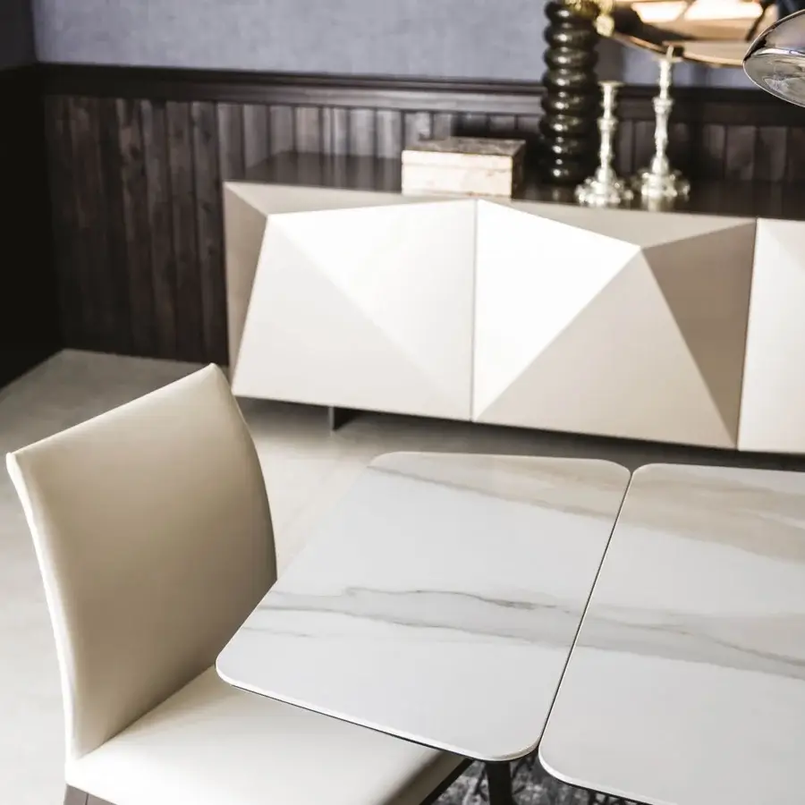 Innovative Cattelan Italia Duffy Keramik table with glossy Golden Calacatta ceramic and graphite embossed steel base