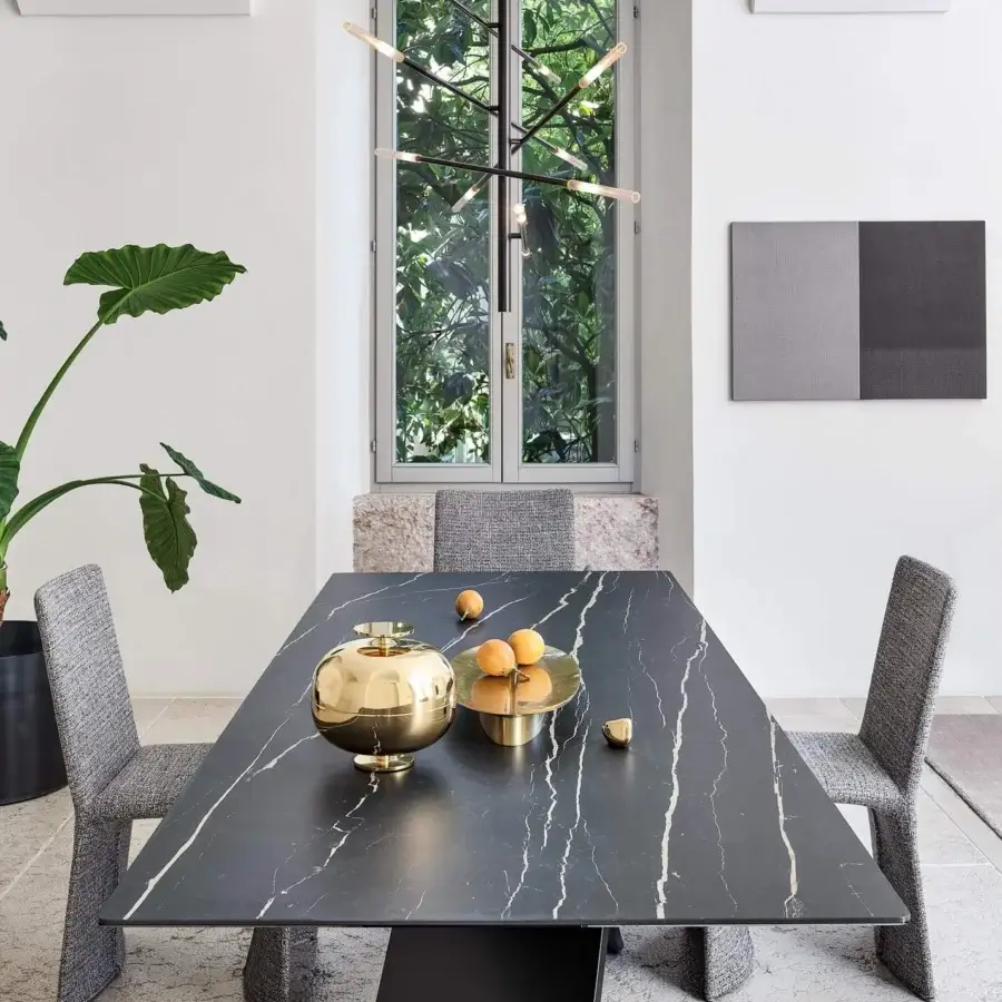 Distinguished Bonaldo AX table with rectangular dark veined ceramic top and black metal X-shaped base in matte finish