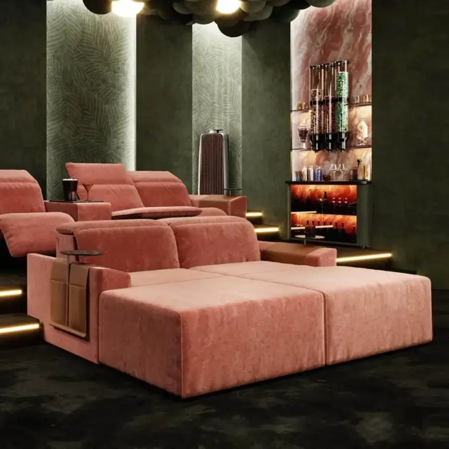 Exceptional Vismara Kubrik home cinema seating with double reclining mechanism in muted pink textile and matte finish with brown integrated side tables