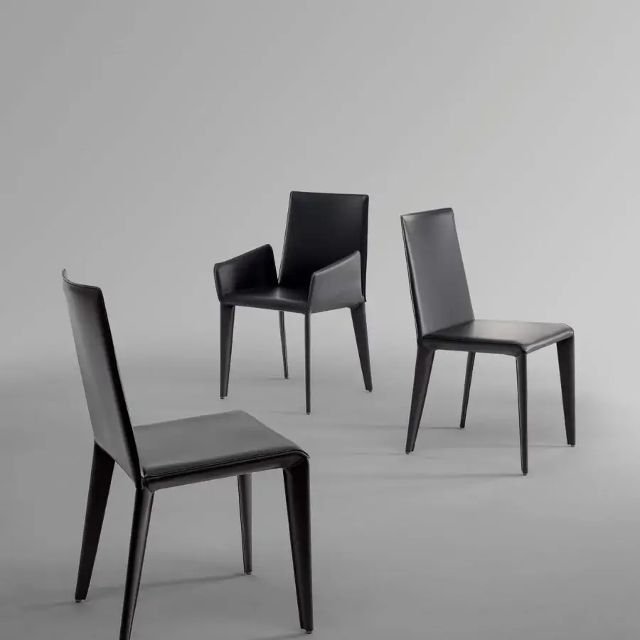 Sophisticated Bonaldo Filly chair upholstered in sleek black leather or eco-leather with matching black metal legs
