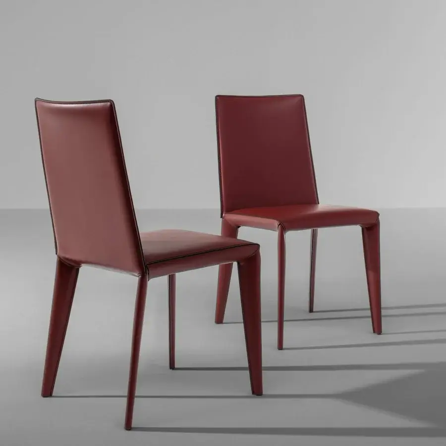 Exceptional Bonaldo Filly chair with reddish-brown leather upholstery and sleek metal legs crafted for aesthetic perfection