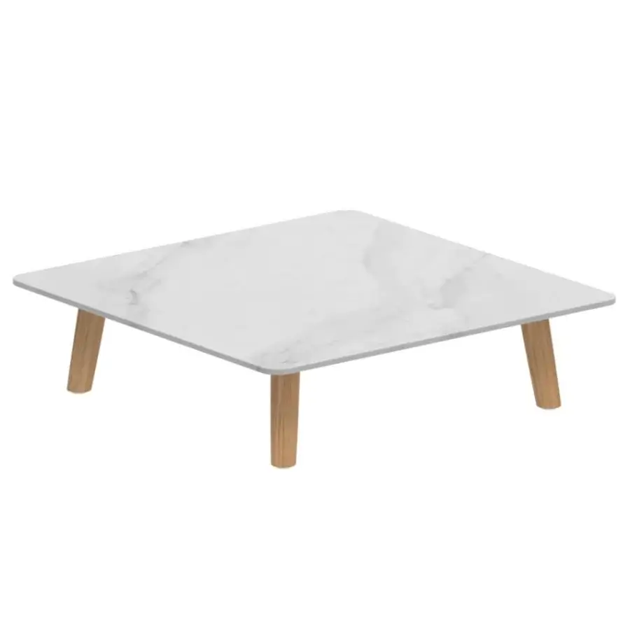 High-end Royal Botania Mambo Lounge coffee table, rectangular, with light marble-like top, and natural wooden base finish.
