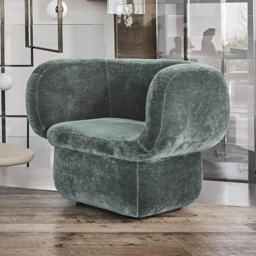 Distinguished Ditre Italia Vento lounge chair with muted green-gray textile and curved lines crafted in Italy with a matte finish