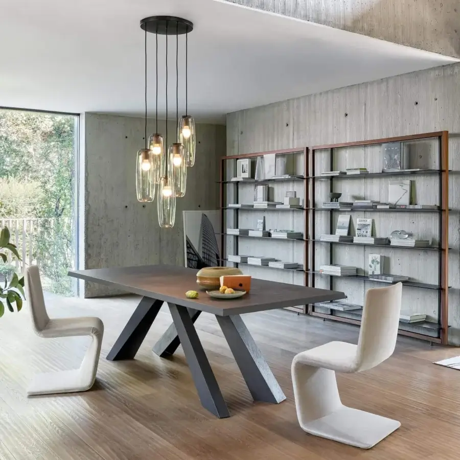 Exceptional Bonaldo Big table with hand-spatulated clay top and dark gray stone-like finish, showcasing intersecting angled legs