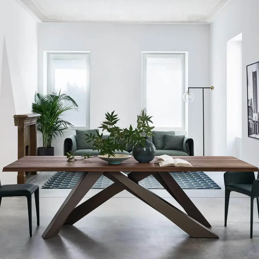 Captivating Bonaldo Big table with warm brown veneered wood and dark bronze laser-cut steel legs crafted in Italy