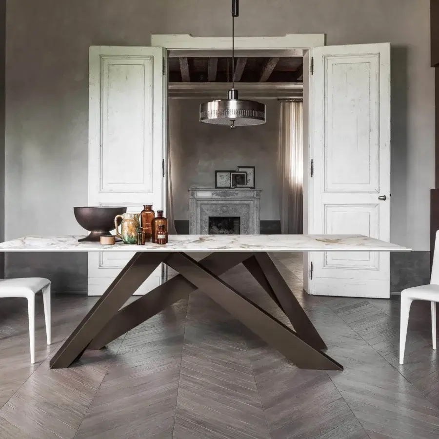 Distinctive Bonaldo Big table with a light-toned marbled veneered top and intersecting brown laser-cut steel legs