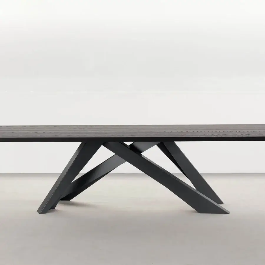 Elegant Bonaldo Big table with a veneered wood top and intersecting laser-cut steel legs finished in a dark tone