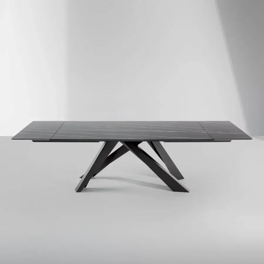Elegant Bonaldo Big extendable table with dark ceramic top and laser-cut steel legs crafted in a uniform tone